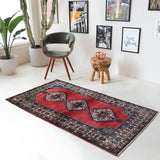 Vintage Turkish rug in a living room setting, pile rug, Turkish rug, vintage rug, portland, rug shop, bright colors, wild shaman, soft rug, bold color, Portland, Oregon, rug store, rug shop, local shop