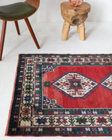 Vintage Turkish rug in a living room setting, pile rug, Turkish rug, vintage rug, portland, rug shop, bright colors, wild shaman, soft rug, bold color, Portland, Oregon, rug store, rug shop, local shop