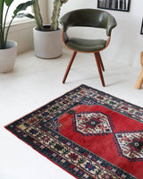 Vintage Turkish rug in a living room setting, pile rug, Turkish rug, vintage rug, portland, rug shop, bright colors, wild shaman, soft rug, bold color, Portland, Oregon, rug store, rug shop, local shop