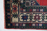 Vintage Turkish rug in a living room setting, pile rug, Turkish rug, vintage rug, portland, rug shop, bright colors, wild shaman, soft rug, bold color, Portland, Oregon, rug store, rug shop, local shop