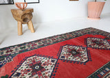 Vintage Turkish rug in a living room setting, pile rug, Turkish rug, vintage rug, portland, rug shop, bright colors, wild shaman, soft rug, bold color, Portland, Oregon, rug store, rug shop, local shop