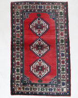 Vintage Turkish rug in a living room setting, pile rug, Turkish rug, vintage rug, portland, rug shop, bright colors, wild shaman, soft rug, bold color, Portland, Oregon, rug store, rug shop, local shop