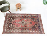 Vintage Turkish rug in living room setting, old rug, antique rug, pastel colors, faded colors, Turkish rug, vintage rug, soft rug, Portland, Oregon, rug store, rug shop, local shop