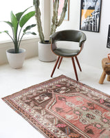 Vintage Turkish rug in living room setting, old rug, antique rug, pastel colors, faded colors, Turkish rug, vintage rug, soft rug, Portland, Oregon, rug store, rug shop, local shop
