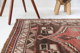 Vintage Turkish rug in living room setting, old rug, antique rug, pastel colors, faded colors, Turkish rug, vintage rug, soft rug, Portland, Oregon, rug store, rug shop, local shop