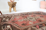 Vintage Turkish rug in living room setting, old rug, antique rug, pastel colors, faded colors, Turkish rug, vintage rug, soft rug, Portland, Oregon, rug store, rug shop, local shop