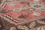 Vintage Turkish rug in living room setting, old rug, antique rug, pastel colors, faded colors, Turkish rug, vintage rug, soft rug, Portland, Oregon, rug store, rug shop, local shop