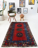 Vintage Turkish rug in a living room setting, pile rug, Turkish rug, vintage rug, portland, rug shop, bright colors, wild shaman, soft rug, bold color, Portland, Oregon, rug store, rug shop, local shop