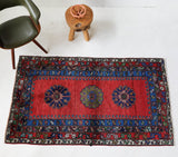 Vintage Turkish rug in a living room setting, pile rug, Turkish rug, vintage rug, portland, rug shop, bright colors, wild shaman, soft rug, bold color, Portland, Oregon, rug store, rug shop, local shop