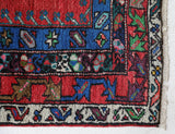 Vintage Turkish rug in a living room setting, pile rug, Turkish rug, vintage rug, portland, rug shop, bright colors, wild shaman, soft rug, bold color, Portland, Oregon, rug store, rug shop, local shop