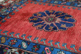 Vintage Turkish rug in a living room setting, pile rug, Turkish rug, vintage rug, portland, rug shop, bright colors, wild shaman, soft rug, bold color, Portland, Oregon, rug store, rug shop, local shop