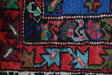 Vintage Turkish rug in a living room setting, pile rug, Turkish rug, vintage rug, portland, rug shop, bright colors, wild shaman, soft rug, bold color, Portland, Oregon, rug store, rug shop, local shop