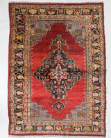 Vintage Turkish rug in a living room setting, pile rug, Turkish rug, vintage rug, portland, rug shop, bright colors, wild shaman, soft rug, bold color, Portland, Oregon, rug store, rug shop, local shop