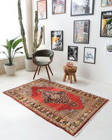 Vintage Turkish rug in a living room setting, pile rug, Turkish rug, vintage rug, portland, rug shop, bright colors, wild shaman, soft rug, bold color, Portland, Oregon, rug store, rug shop, local shop