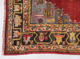 Vintage Turkish rug in a living room setting, pile rug, Turkish rug, vintage rug, portland, rug shop, bright colors, wild shaman, soft rug, bold color, Portland, Oregon, rug store, rug shop, local shop
