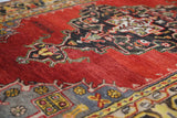 Vintage Turkish rug in a living room setting, pile rug, Turkish rug, vintage rug, portland, rug shop, bright colors, wild shaman, soft rug, bold color, Portland, Oregon, rug store, rug shop, local shop