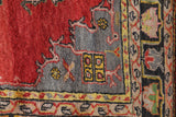 Vintage Turkish rug in a living room setting, pile rug, Turkish rug, vintage rug, portland, rug shop, bright colors, wild shaman, soft rug, bold color, Portland, Oregon, rug store, rug shop, local shop