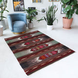 Vintage kilim rug in living room setting, bright colors, wild shaman, soft rug, bold color, Portland, Oregon, rug store, rug shop, local shop, vintage rug, modern kilim, warm colors