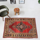 Vintage Turkish rug in a living room setting, pile rug, Turkish rug, vintage rug, portland, rug shop, bright colors, wild shaman, soft rug, bold color, Portland, Oregon, rug store, rug shop, local shop