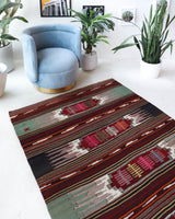 Vintage kilim rug in living room setting, bright colors, wild shaman, soft rug, bold color, Portland, Oregon, rug store, rug shop, local shop, vintage rug, modern kilim, warm colors