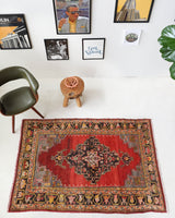 Vintage Turkish rug in a living room setting, pile rug, Turkish rug, vintage rug, portland, rug shop, bright colors, wild shaman, soft rug, bold color, Portland, Oregon, rug store, rug shop, local shop