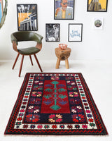 Vintage Turkish rug in a living room setting, pile rug, Turkish rug, vintage rug, portland, rug shop, bright colors, wild shaman, soft rug, bold color, Portland, Oregon, rug store, rug shop, local shop