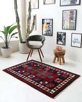 Vintage Turkish rug in a living room setting, pile rug, Turkish rug, vintage rug, portland, rug shop, bright colors, wild shaman, soft rug, bold color, Portland, Oregon, rug store, rug shop, local shop