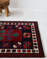 Vintage Turkish rug in a living room setting, pile rug, Turkish rug, vintage rug, portland, rug shop, bright colors, wild shaman, soft rug, bold color, Portland, Oregon, rug store, rug shop, local shop