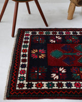 Vintage Turkish rug in a living room setting, pile rug, Turkish rug, vintage rug, portland, rug shop, bright colors, wild shaman, soft rug, bold color, Portland, Oregon, rug store, rug shop, local shop