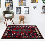Vintage Turkish rug in a living room setting, pile rug, Turkish rug, vintage rug, portland, rug shop, bright colors, wild shaman, soft rug, bold color, Portland, Oregon, rug store, rug shop, local shop