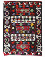 Vintage kilim rug in living room setting, bright colors, wild shaman, soft rug, bold color, Portland, Oregon, rug store, rug shop, local shop, vintage rug, modern kilim, warm colors