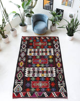 Vintage kilim rug in living room setting, bright colors, wild shaman, soft rug, bold color, Portland, Oregon, rug store, rug shop, local shop, vintage rug, modern kilim, warm colors