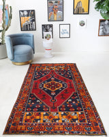Vintage Turkish rug in a living room setting, pile rug, Turkish rug, vintage rug, portland, rug shop, bright colors, wild shaman, soft rug, bold color, Portland, Oregon, rug store, rug shop, local shop