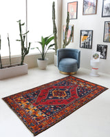 Vintage Turkish rug in a living room setting, pile rug, Turkish rug, vintage rug, portland, rug shop, bright colors, wild shaman, soft rug, bold color, Portland, Oregon, rug store, rug shop, local shop