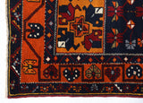 Vintage Turkish rug in a living room setting, pile rug, Turkish rug, vintage rug, portland, rug shop, bright colors, wild shaman, soft rug, bold color, Portland, Oregon, rug store, rug shop, local shop