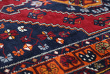 Vintage Turkish rug in a living room setting, pile rug, Turkish rug, vintage rug, portland, rug shop, bright colors, wild shaman, soft rug, bold color, Portland, Oregon, rug store, rug shop, local shop