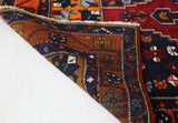 Vintage Turkish rug in a living room setting, pile rug, Turkish rug, vintage rug, portland, rug shop, bright colors, wild shaman, soft rug, bold color, Portland, Oregon, rug store, rug shop, local shop