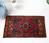 Vintage Turkish rug in a living room setting, pile rug, Turkish rug, vintage rug, portland, rug shop, bright colors, wild shaman, soft rug, bold color, Portland, Oregon, rug store, rug shop, local shop