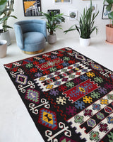 Vintage kilim rug in living room setting, bright colors, wild shaman, soft rug, bold color, Portland, Oregon, rug store, rug shop, local shop, vintage rug, modern kilim, warm colors