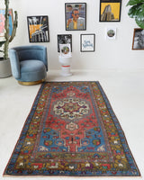 Vintage Turkish rug in living room setting, old rug, antique rug, pastel colors, faded colors, Turkish rug, vintage rug, soft rug, Portland, Oregon, rug store, rug shop, local shop