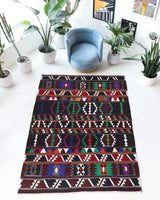 Vintage kilim rug in living room setting, bright colors, wild shaman, soft rug, bold color, Portland, Oregon, rug store, rug shop, local shop, vintage rug, modern kilim, warm colors
