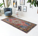 Vintage Turkish rug in living room setting, old rug, antique rug, pastel colors, faded colors, Turkish rug, vintage rug, soft rug, Portland, Oregon, rug store, rug shop, local shop