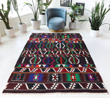 Vintage kilim rug in living room setting, bright colors, wild shaman, soft rug, bold color, Portland, Oregon, rug store, rug shop, local shop, vintage rug, modern kilim, warm colors