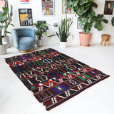 Vintage kilim rug in living room setting, bright colors, wild shaman, soft rug, bold color, Portland, Oregon, rug store, rug shop, local shop, vintage rug, modern kilim, warm colors