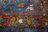 Vintage Turkish rug in living room setting, old rug, antique rug, pastel colors, faded colors, Turkish rug, vintage rug, soft rug, Portland, Oregon, rug store, rug shop, local shop