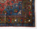 Vintage Turkish rug in living room setting, old rug, antique rug, pastel colors, faded colors, Turkish rug, vintage rug, soft rug, Portland, Oregon, rug store, rug shop, local shop