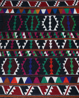 Vintage kilim rug in living room setting, bright colors, wild shaman, soft rug, bold color, Portland, Oregon, rug store, rug shop, local shop, vintage rug, modern kilim, warm colors