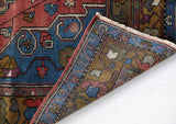 Vintage Turkish rug in living room setting, old rug, antique rug, pastel colors, faded colors, Turkish rug, vintage rug, soft rug, Portland, Oregon, rug store, rug shop, local shop