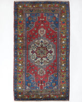 Vintage Turkish rug in a living room setting, pile rug, Turkish rug, vintage rug, portland, rug shop, bright colors, wild shaman, soft rug, bold color, Portland, Oregon, rug store, rug shop, local shop, antique rug