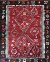 Vintage kilim rug in living room setting, bright colors, wild shaman, soft rug, bold color, Portland, Oregon, rug store, rug shop, local shop, vintage rug, modern kilim, warm colors